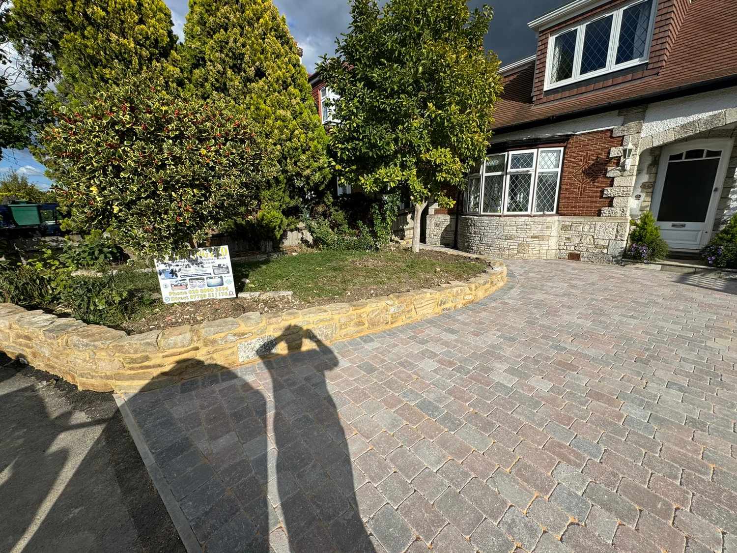Driveway and stone wall