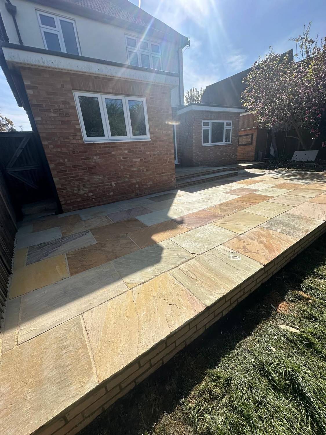 An Indian sandstone patio by T & R Paving